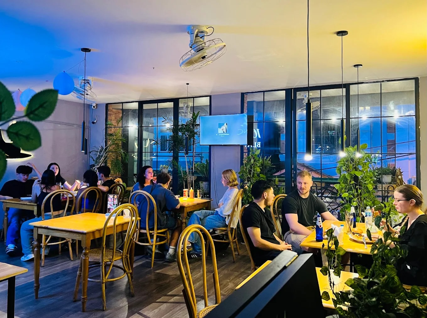 The space is both cozy and romantic, making it perfect for a family meal or a date night